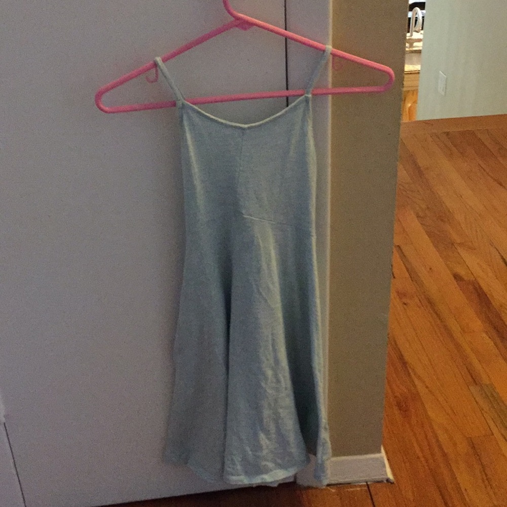 A mint blue, cross strapped, cotton, sun dress.